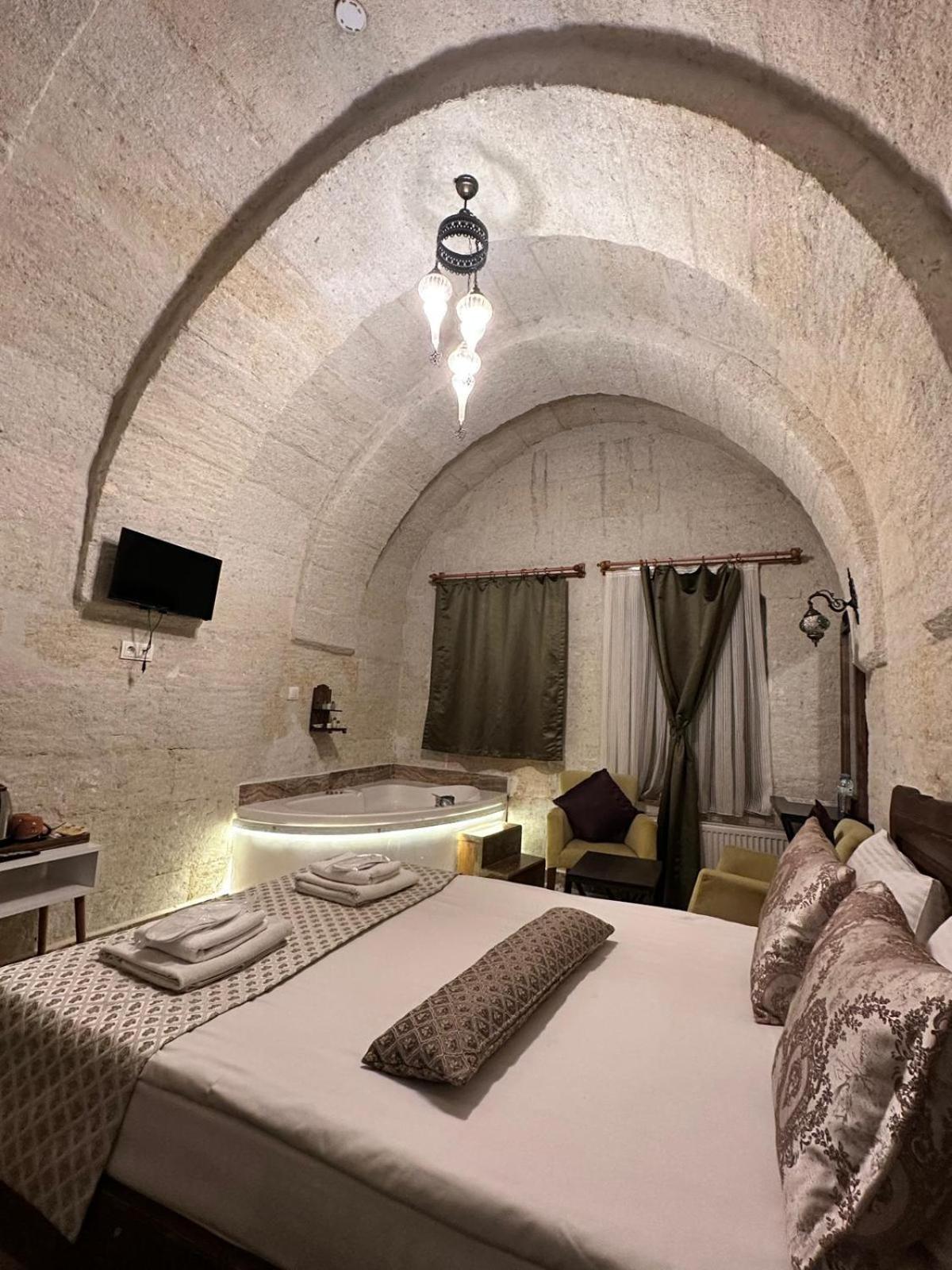 Heritage Cave Inn Hotel Гьореме Стая снимка