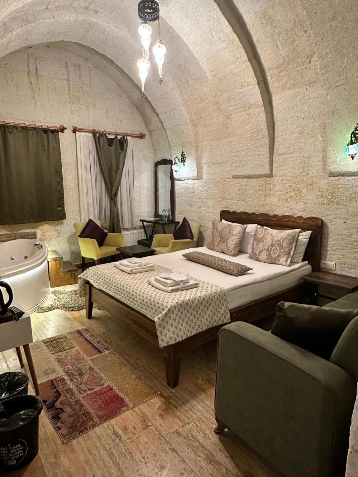Heritage Cave Inn Hotel Гьореме Стая снимка