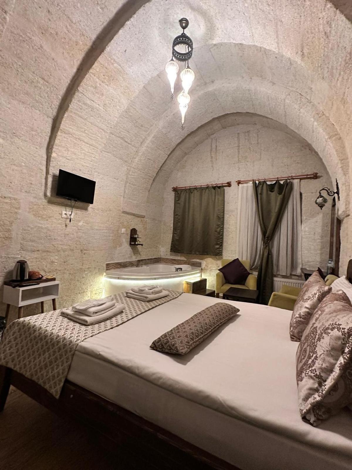 Heritage Cave Inn Hotel Гьореме Стая снимка